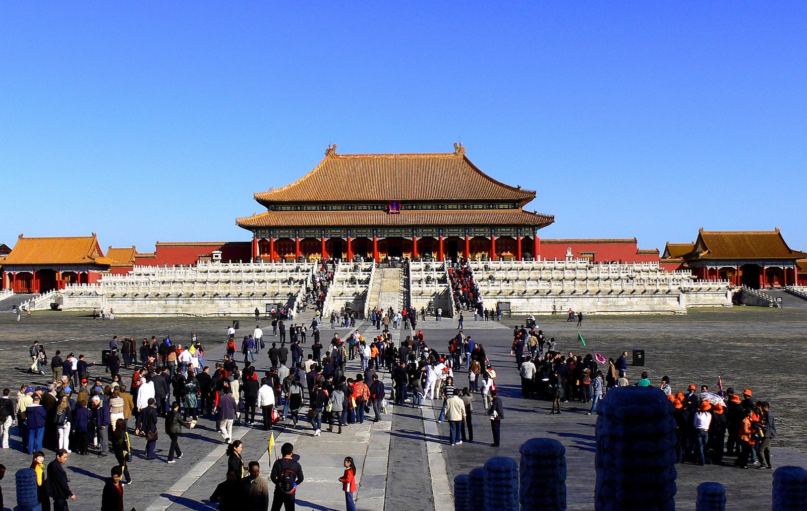 Visitors cross the marble terraces before the Hall of Supreme Harmony.