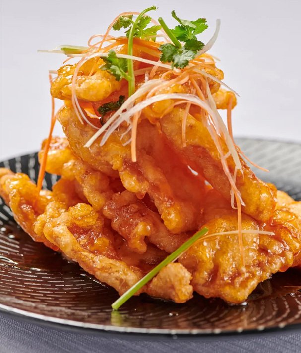 Golden guobaorou with fine vegetable shreds, served at Mumian’s Xiao Nanyang restaurant.