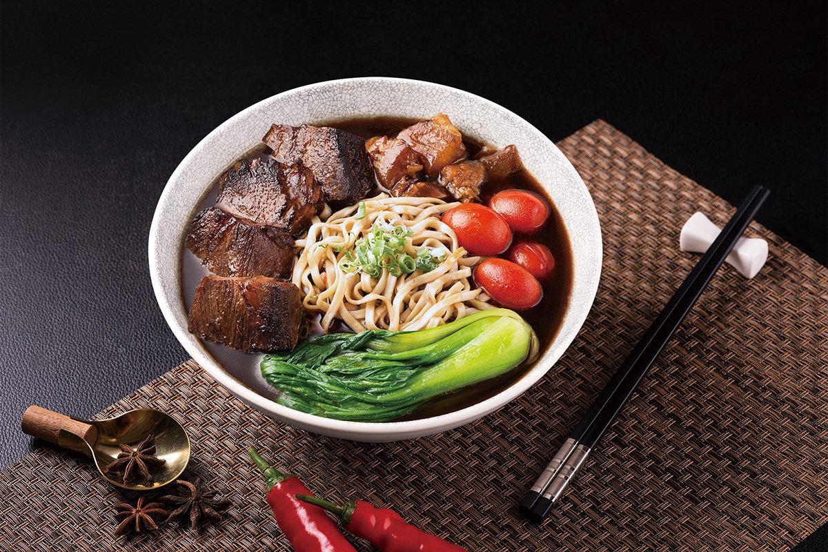 Beef noodle soup with seared beef cheek and vegetables, prepared by eslite hotel in Taipei.