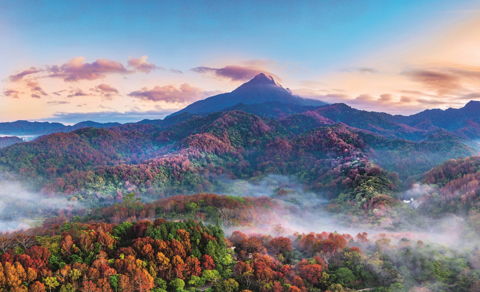 Wuzhishan’s distinctive peaks rise above Hainan’s tropical rainforest.