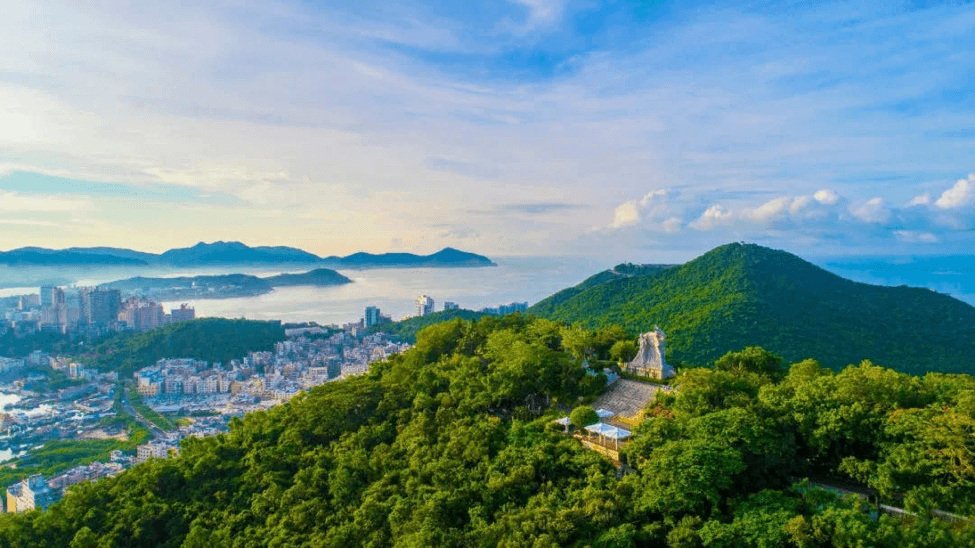 Luhuitou’s hilltop sculpture overlooks Sanya’s coastline and wooded hills.