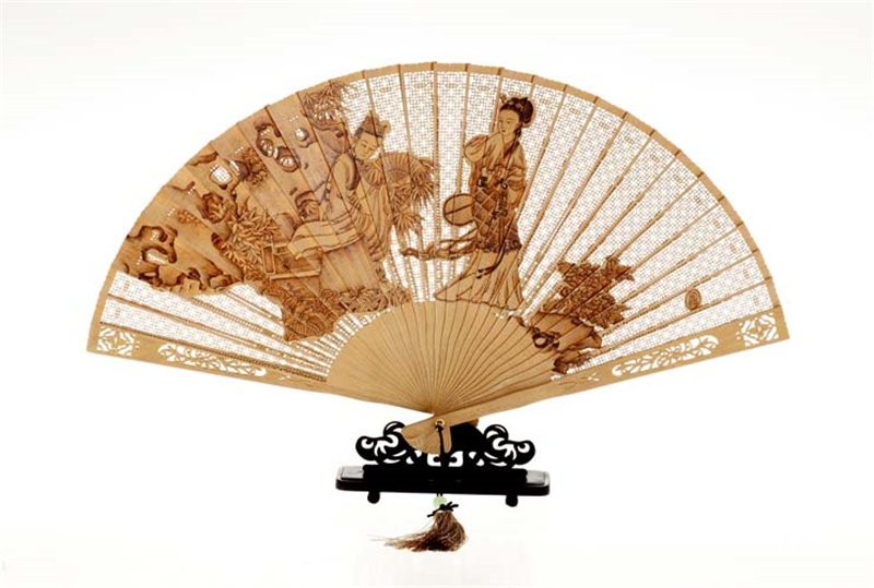 Sandalwood folding fan with pierced garden scene